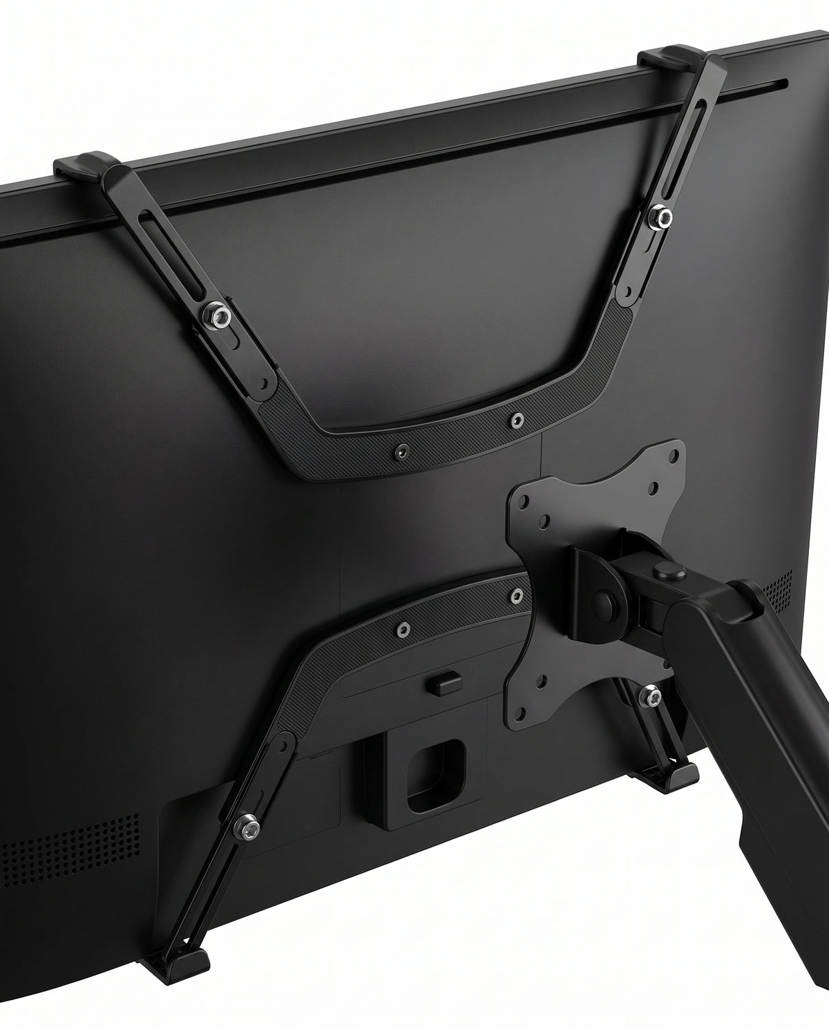 Close view of the VESA adapter bracket clamped to a monitor back with the arm plate bolted on