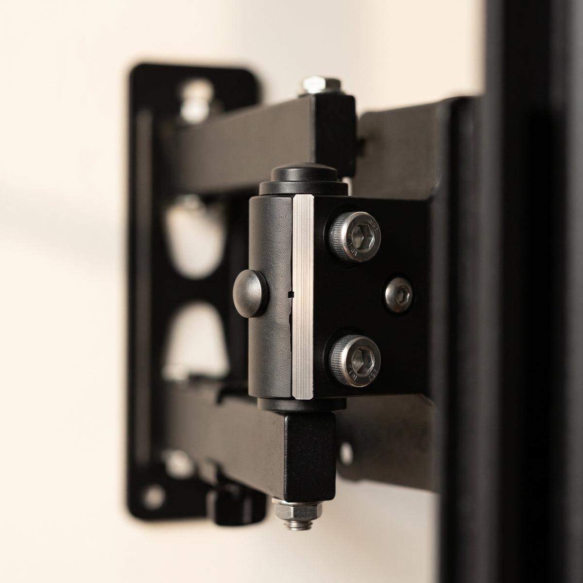 Side view of the telescopic TV wall mount fixed to a wall